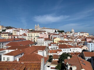 Fototapeta na wymiar Alfama is Lisbon's most emblematic quarter and one of the most rewarding for walkers and photographers thanks to its medieval alleys and outstanding views.