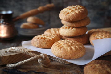 Homemade shortbread cookies with cinnamon and cezve for coffee breaks