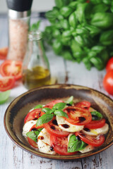 A bowl with traditional Italian caprese salad