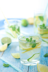 Glasses with lemon and lime lemonade