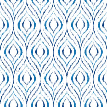 Ikat seamless pattern. Blue ogee texture. Geometric background. Repeated navajo pattern. Repeating traditional motif for design prints. Bohemian ornament. Ethno tribal textile. Vector illustration