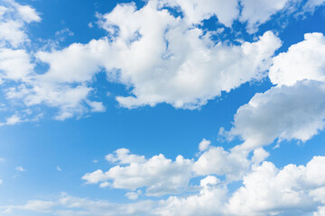 Naklejka na ściany i meble Clouds and blue sky. Cirrus and cumulus clouds on blue sky background.