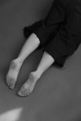 details of the dancer's body, feet during the dance, fuzzy and blurred film photography