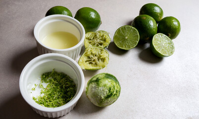 Lemons in different stages on a white table