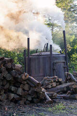 Fototapeta na wymiar burning charcoal in the furnace, Bieszczady