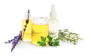 Bottles of natural essential oils on white background