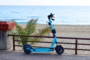 electric scooter on the promenade by the sea