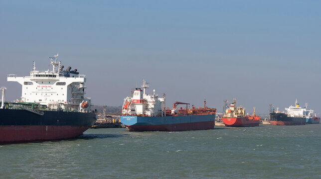 Fawley Refinery, Southampton, England, UK. 2022. Bulk oil and chemical tanker ships discharging cargo alongside Fawley refinery on Southampton Water.