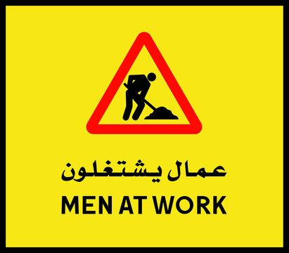 Men at Work sign in English and Arabic