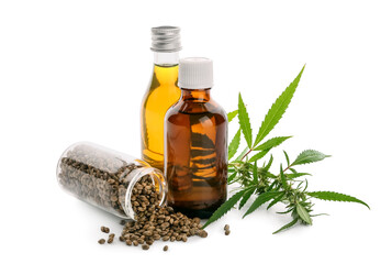 Bottles of CBD oil on white background