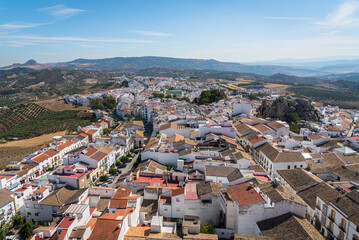 Obraz premium Scenic view of the beautiful andalusian white town of Olvera in the Natural Park of Grazalema mountain range at daylight, Cadiz province, Andalusia, Spain