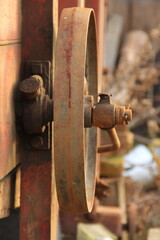 Old machine rusty flywheel detail