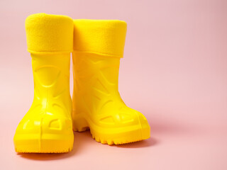 children's yellow rubber boots close-up