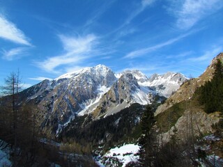 Winter view of mountains Stol in Karavanke mountains in Gorenjska region of Slovenia covered in...
