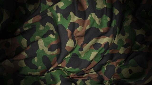 Realistic slow motion 3D animation of the dark camouflage pattern cotton cloth as fly away opener rendered in UHD with alpha matte