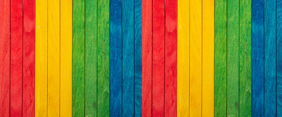 Rainbow of colorful wooden stick making a wallpaper