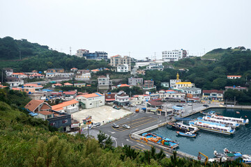 The Hill of Wind is a famous tourist destination in Korea with pretty windmills.
