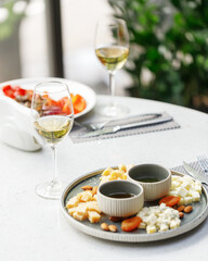 traditional wine appetizers. white and red wine. restaurant serving. summer mood. shallow depth of field