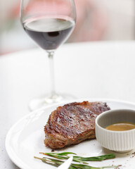 traditional wine appetizers. white and red wine. restaurant serving. summer mood. shallow depth of field