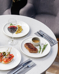 traditional wine appetizers. white and red wine. restaurant serving. summer mood. shallow depth of field