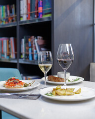 traditional wine appetizers. white and red wine. restaurant serving. summer mood. shallow depth of field