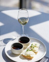 traditional wine appetizers. white and red wine. restaurant serving. summer mood. shallow depth of field