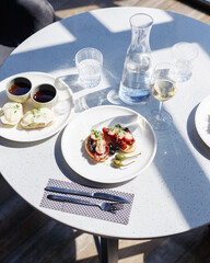 traditional wine appetizers. white and red wine. restaurant serving. summer mood. shallow depth of field