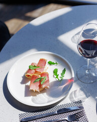 traditional wine appetizers. white and red wine. restaurant serving. summer mood. shallow depth of field