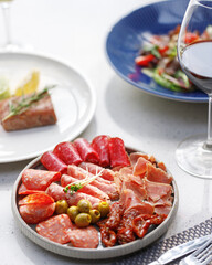 traditional wine appetizers. white and red wine. restaurant serving. summer mood. shallow depth of field