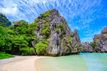 Hidden beach in Matinloc Island, El Nido, Palawan, Philippines - Paradise lagoon and beach in tropical scenery