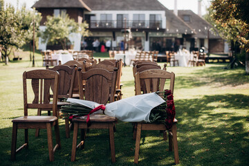wedding ceremony preparation, wooden folding chairs