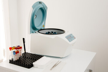 test tube machine,  a centrifuge in laboratory. 