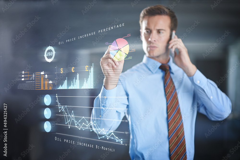 Poster The future of statistics. Cropped shot of a handsome young businessman talking on the phone while using a digital interface.