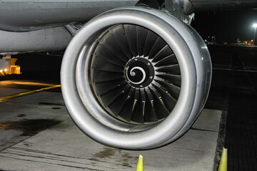 Airplane turbine at Cartagena airport, Colombia. Fossil fuel airplane exterior night activity