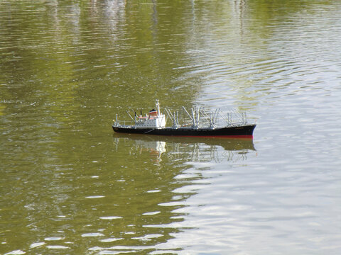 A remote control boat - Cargo ship Hammonia in calm waters on a lake