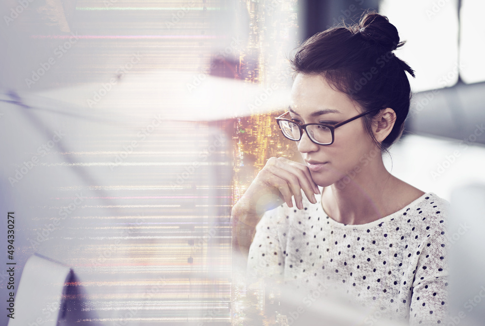 Poster Getting focused on the project. Multiple exposure shot of a young woman using a computer at work superimposed over a city background.
