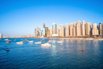 Obraz premium Beautiful modern residential buildings with beach in foreground