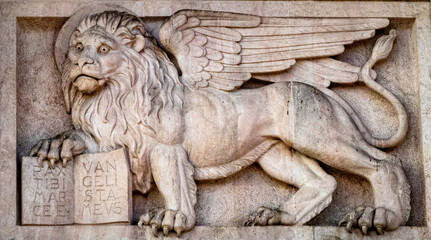 Closeup shot of a winged lion of San Marco positioned on the San Giacomo gate in Bergam