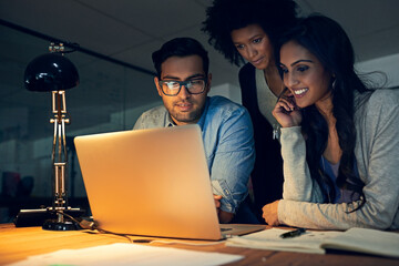 Theyre all equally committed to accomplishing their deadlines. Cropped shot of a group of...
