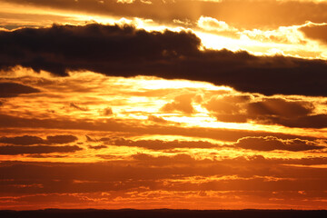 Vivid sunset through the clouds