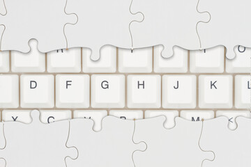 Joining together on the internet concept puzzle and keyboard