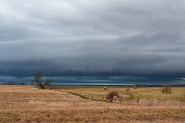 Storm Clouds Over a Farm Field