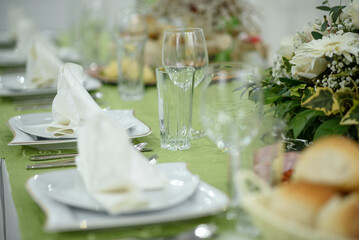 Angle shot of a clean wedding table set.