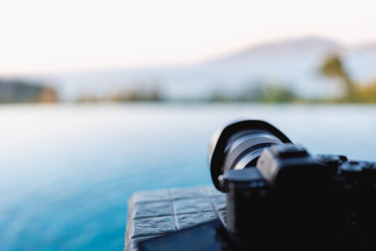 A camera was placed on the balcony to capture beautiful natural sea and mountain views, sunset scene. Selective focus.
