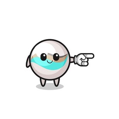 marble toy mascot with pointing right gesture