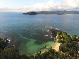 Aerial drone view of the tropical Ilheu das Rolas island in Sao Tome, Africa