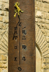 sundial with zodiac signs