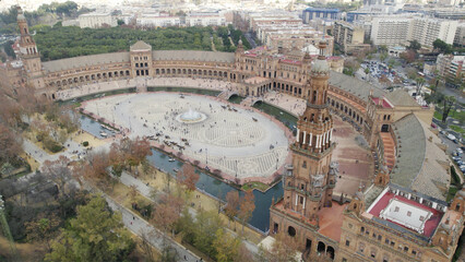 Aerial view of Plaza de Espana during daytime Parque de Maria Luisa, Seville, Spain - obrazy, fototapety, plakaty