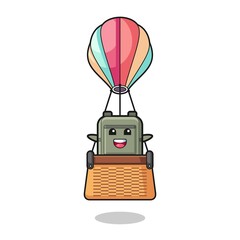 school bag mascot riding a hot air balloon