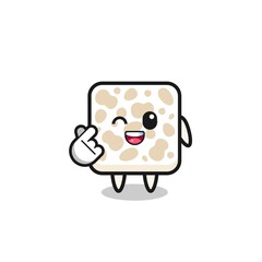 tempeh character doing Korean finger heart